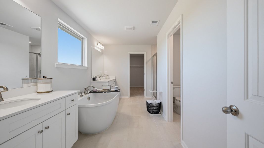 Representative furnished interior of a home built from the Stonefield - Side Entry by DRB Homes in Brighton, Locust Grove (Image 26).