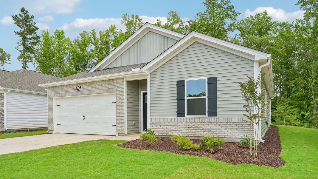 Representative exterior photo of a completed home built from the Freeport by D.R. Horton in The Villas at Laurel Oaks, Sanford, NC (Image 2). Representative exterior photo of a completed home built from the Freeport by D.R. Horton in The Villas at Laurel Oaks, Sanford, NC (Image 2).
