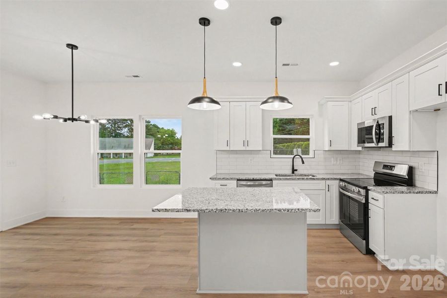 Furnished interior view inside a new home in , Charlotte (Image 13).