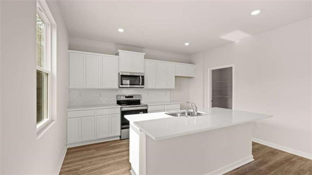 Furnished interior view inside a new home in The Reserve at Calcutta, Stockbridge (Image 3).