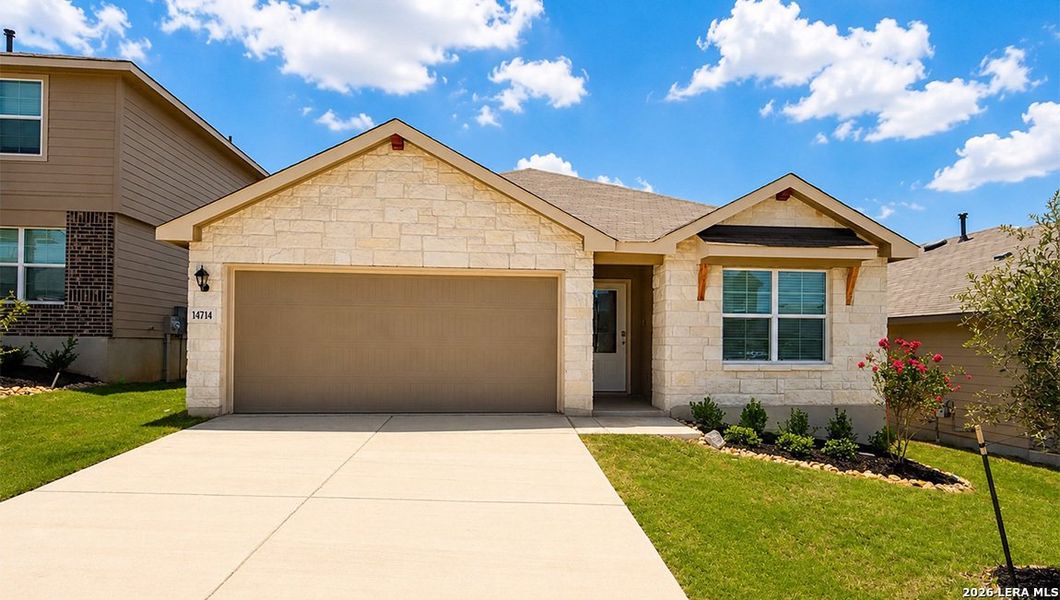 Front exterior of a new home in Stonehill, San Antonio, TX, highlighting curb appeal (Image 1). Front exterior of a new home in Stonehill, San Antonio, TX, highlighting curb appeal (Image 1).