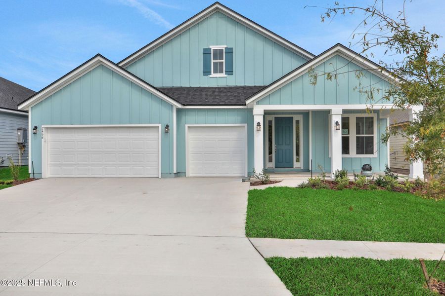Front exterior of a new home in Jennings Farm, Middleburg, FL, highlighting curb appeal (Image 1).