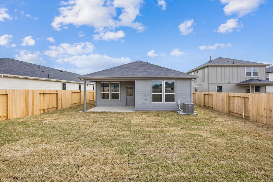 Exterior details and patio area of a home in Montgomery Bend, Montgomery (Image 4).