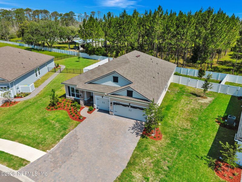 Front exterior of a new home in , Yulee, FL, highlighting curb appeal (Image 27).