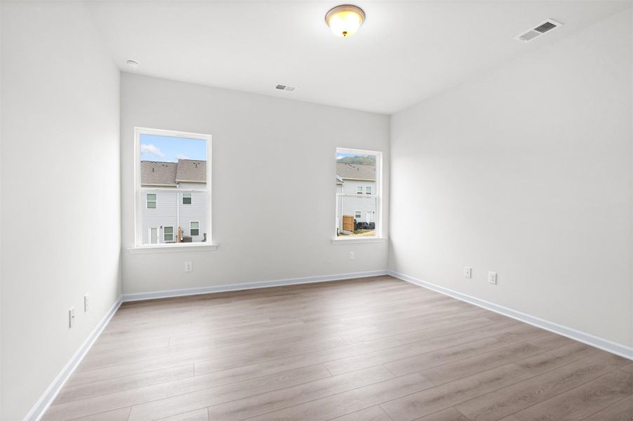 The Dove- Primary Suite. Home under construction, photo used for illustrative purposes only, colors and options will vary.