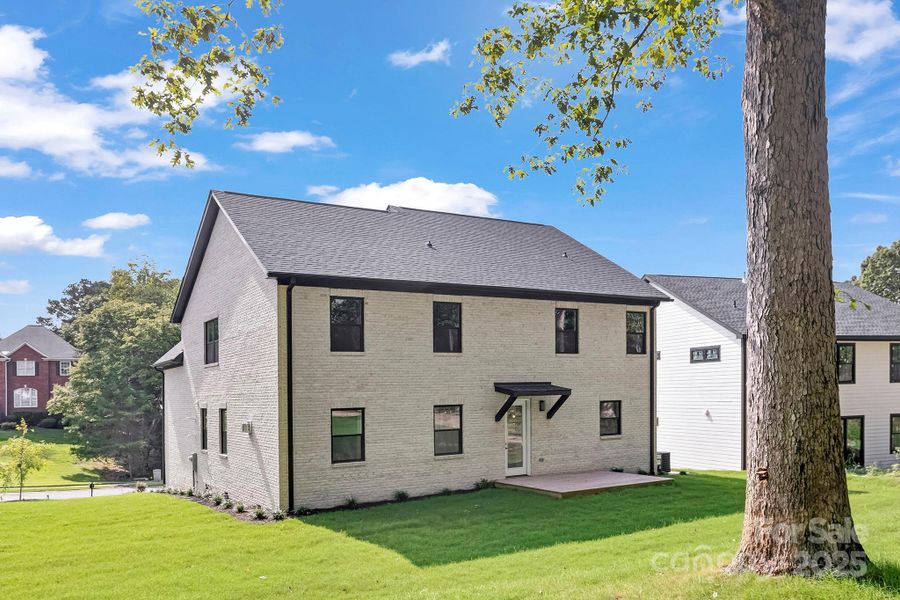 Front exterior of a new home in , Charlotte, NC, highlighting curb appeal (Image 26).