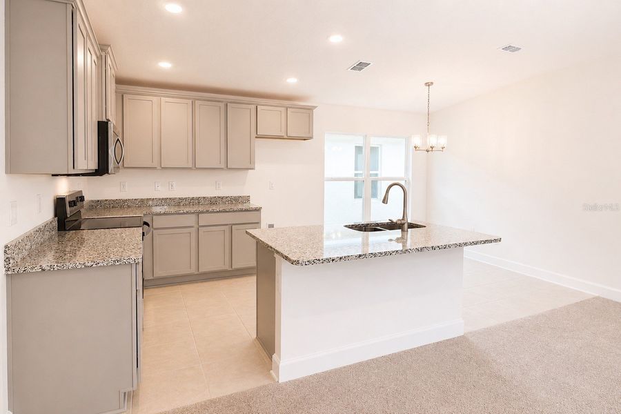 Furnished interior view inside a new home in Harmony Central, St. Cloud (Image 6).