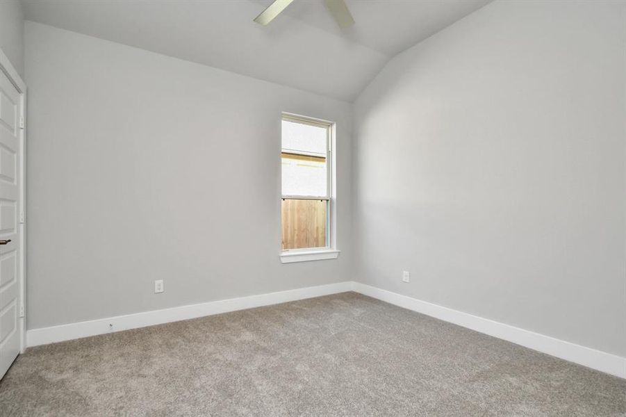 Generously sized secondary bedrooms featuring spacious closets, soft and inviting carpeting underfoot, large windows allowing plenty of natural light, and the added touch of privacy blinds for your personal retreat