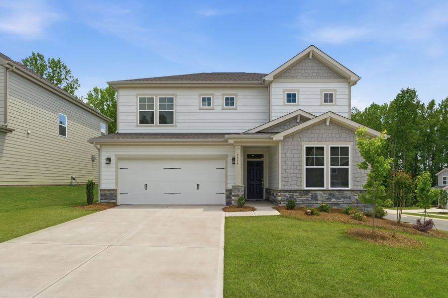 Front exterior of a new home in Cannon Manor, Kannapolis, NC, highlighting curb appeal (Image 1). Front exterior of a new home in Cannon Manor, Kannapolis, NC, highlighting curb appeal (Image 1).
