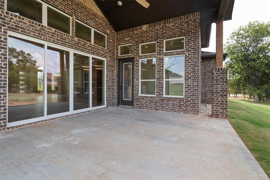 Exterior details and patio area of a home in Pecan Plantation, Granbury (Image 26).