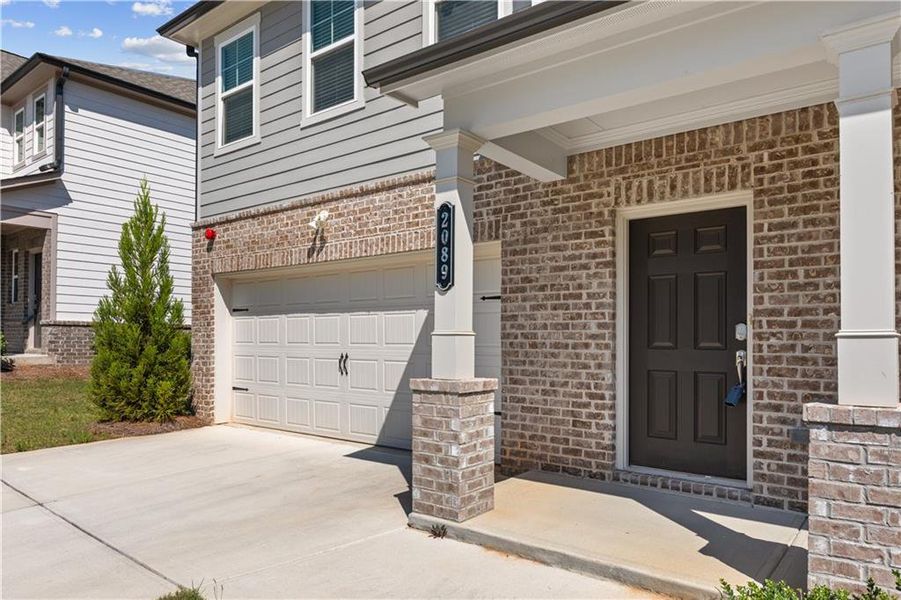 Exterior details and patio area of a home in Timber Ridge, Douglasville (Image 18).
