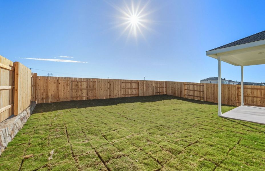 Exterior details and patio area of a home in Sunfield, Buda (Image 4). Exterior details and patio area of a home in Sunfield, Buda (Image 4).