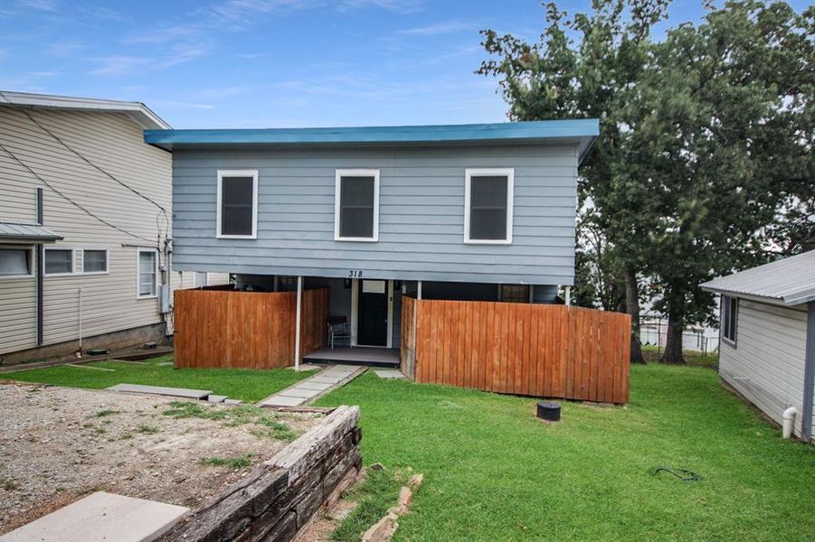 Front exterior of a new home in , Weatherford, TX, highlighting curb appeal (Image 1).
