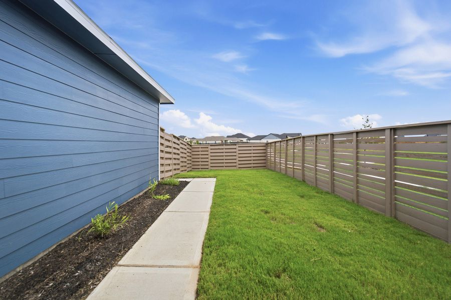 Exterior details and patio area of a home in Austin Point, Richmond (Image 28).