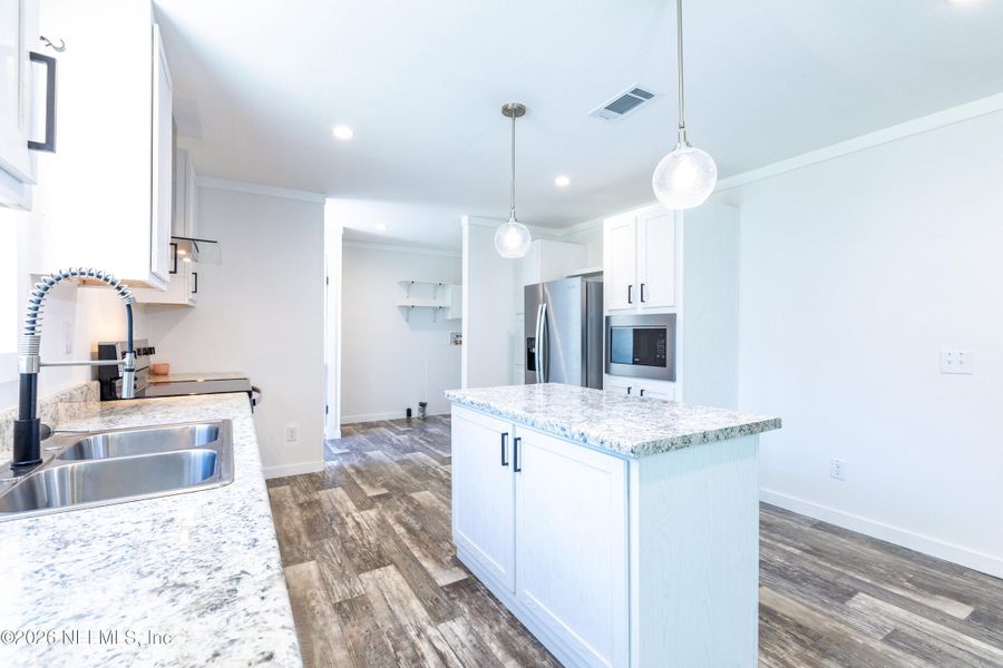 Furnished interior view inside a new home in , Lake Butler (Image 5).