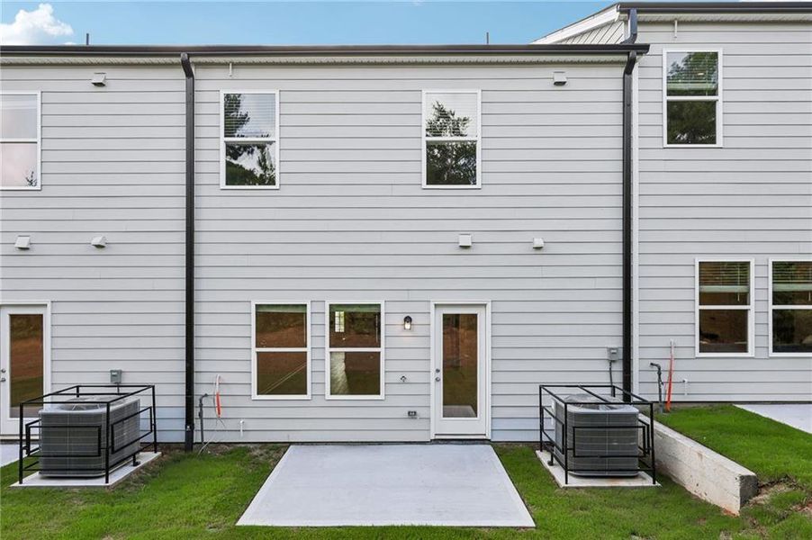 Exterior details and patio area of a home in Artisan Walk, Fairburn (Image 22).