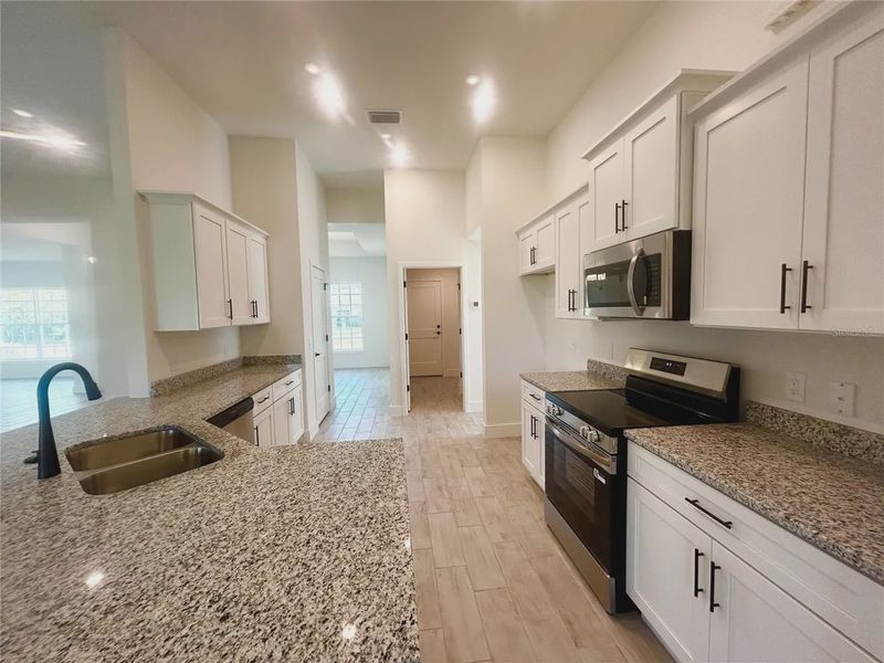Furnished interior view inside a new home in Deep Creek, Punta Gorda (Image 6).