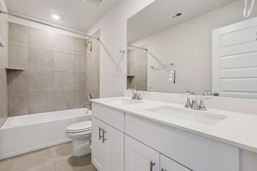 Furnished interior view inside a new home in Landing Meadows - Premier Series, New Caney (Image 11). Furnished interior view inside a new home in Landing Meadows - Premier Series, New Caney (Image 11).