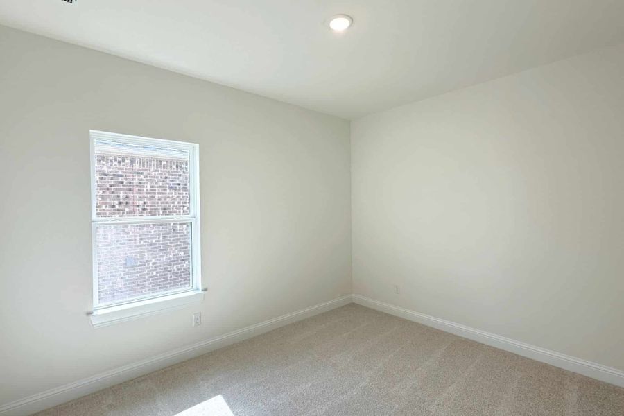 Spacious, unfurnished interior of a new home in Bluffview Reserve, Leander (Image 22).