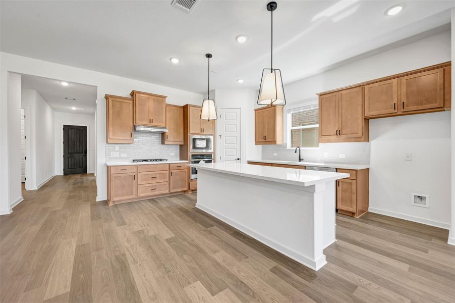 Furnished interior view inside a new home in Heritage, Dripping Springs (Image 6).