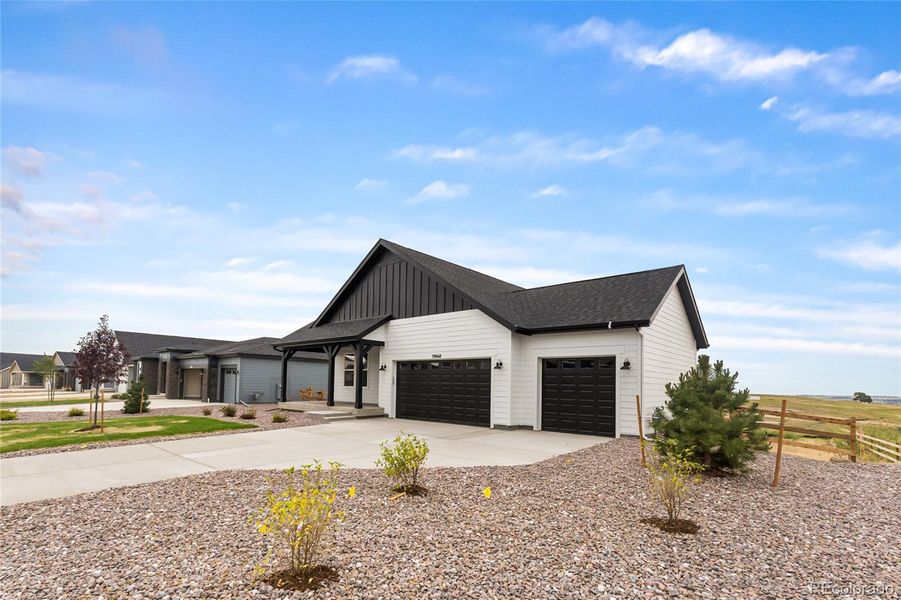 Front exterior of a new home in Independence, Elizabeth, CO, highlighting curb appeal (Image 2). Front exterior of a new home in Independence, Elizabeth, CO, highlighting curb appeal (Image 2).