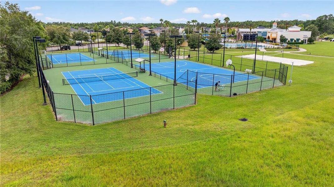Front exterior of a new home in , Land O' Lakes, FL, highlighting curb appeal (Image 2).