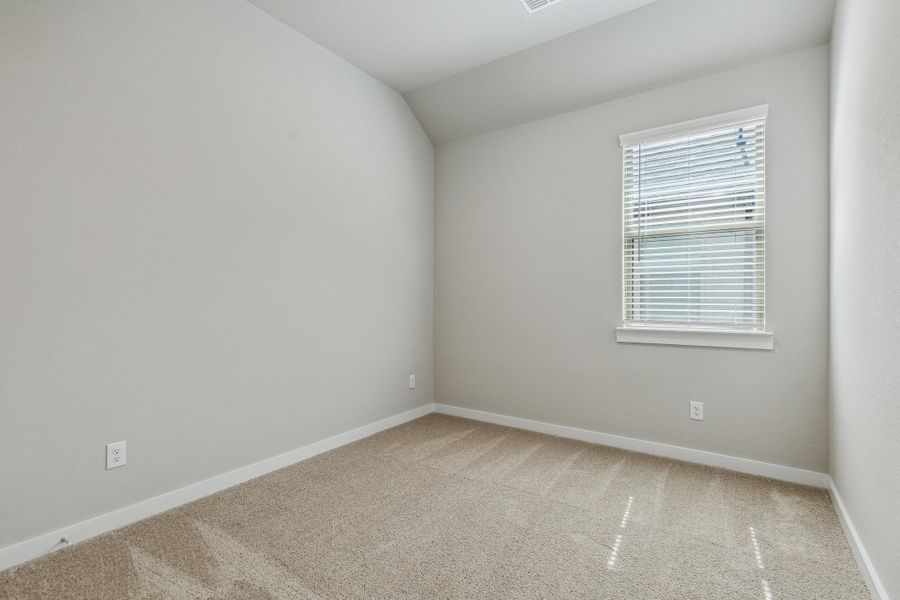 Bedroom in the Birch home plan by Trophy Signature Homes – REPRESENTATIVE PHOTO