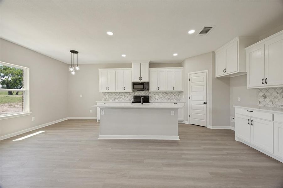Furnished interior view inside a new home in , Savoy (Image 6).