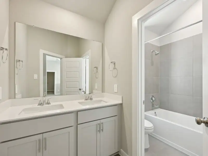 Furnished interior view inside a new home in Stewart's Ranch, Conroe (Image 11).