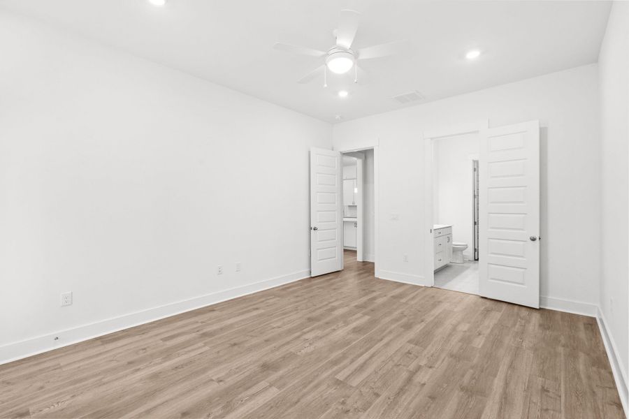 Spacious, unfurnished interior of a new home in Long Bay Golf Club, Longs (Image 28).