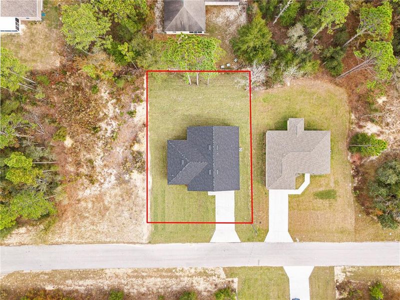 Front exterior of a new home in , Citrus Springs, FL, highlighting curb appeal (Image 26). Front exterior of a new home in , Citrus Springs, FL, highlighting curb appeal (Image 26).