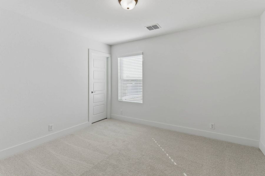 Spacious, unfurnished interior of a new home in Centero at Stone Oak, San Antonio (Image 32).