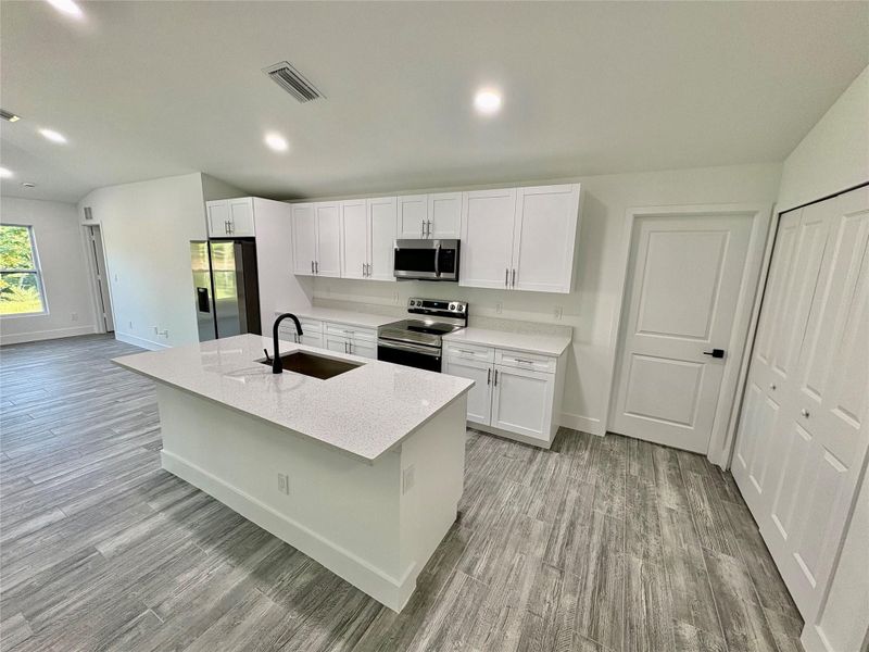 Furnished interior view inside a new home in , Okeechobee (Image 6).