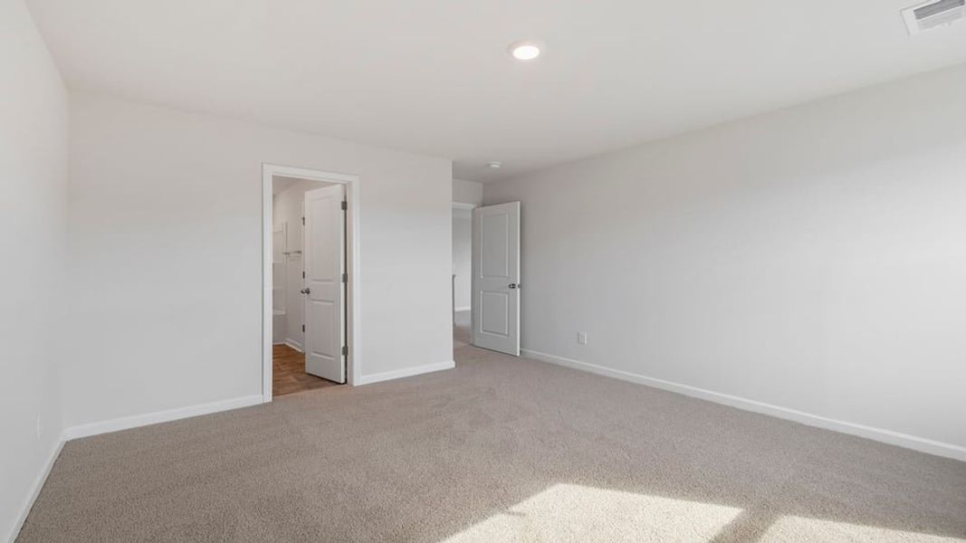 Spacious, unfurnished interior of a new home in Durbin Meadows Traditions, Fountain Inn (Image 30).