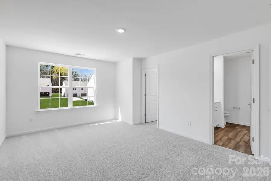 Spacious, unfurnished interior of a new home in Cannon Village, York (Image 10).