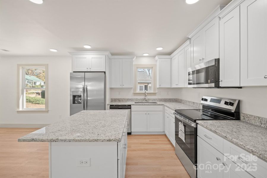 Furnished interior view inside a new home in , Newton (Image 7).