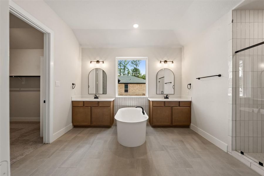Furnished interior view inside a new home in Deer Pines, Conroe (Image 11).
