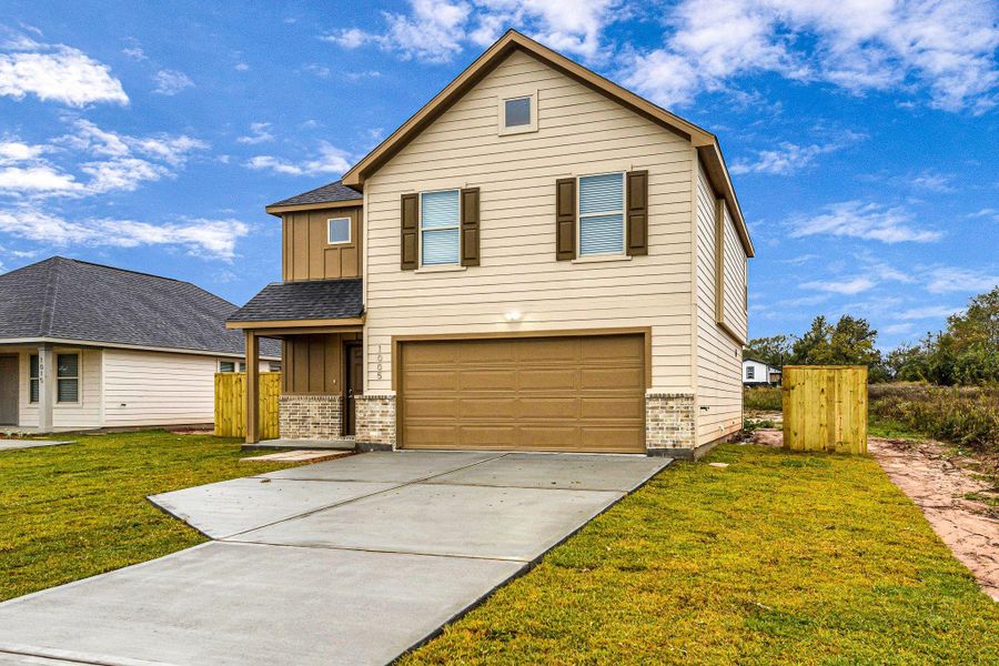 Front exterior of a new home in , Hempstead, TX, highlighting curb appeal (Image 16).