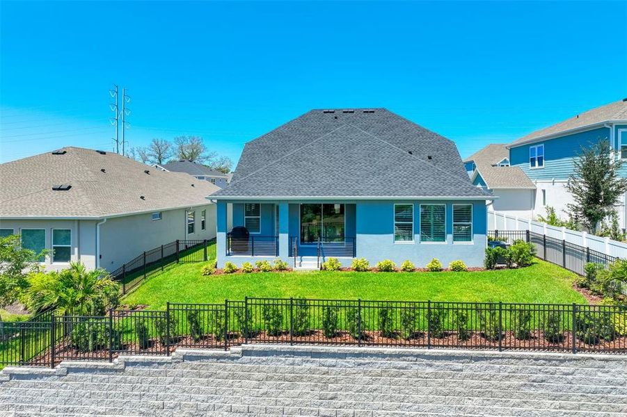 Front exterior of a new home in , Tarpon Springs, FL, highlighting curb appeal (Image 20).