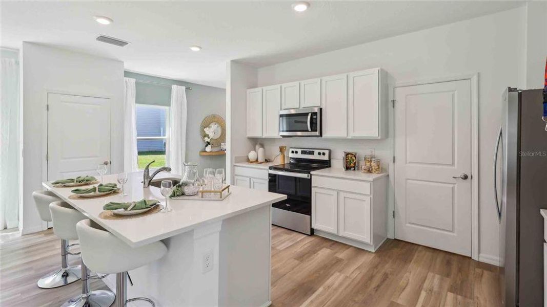 Furnished interior view inside a new home in Sandal Key, Weeki Wachee (Image 13).
