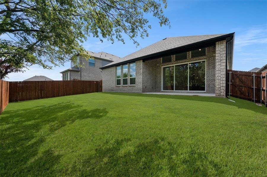 Front exterior of a new home in Birdsong, Mansfield, TX, highlighting curb appeal (Image 22). Front exterior of a new home in Birdsong, Mansfield, TX, highlighting curb appeal (Image 22).