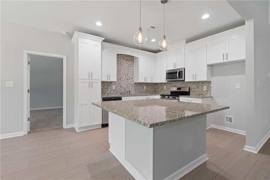 Furnished interior view inside a new home in , Gray (Image 16).