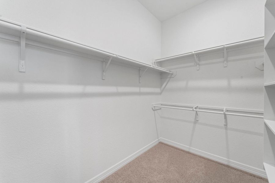 A view of your large primary walk-in Closet A view of your large primary walk-in Closet