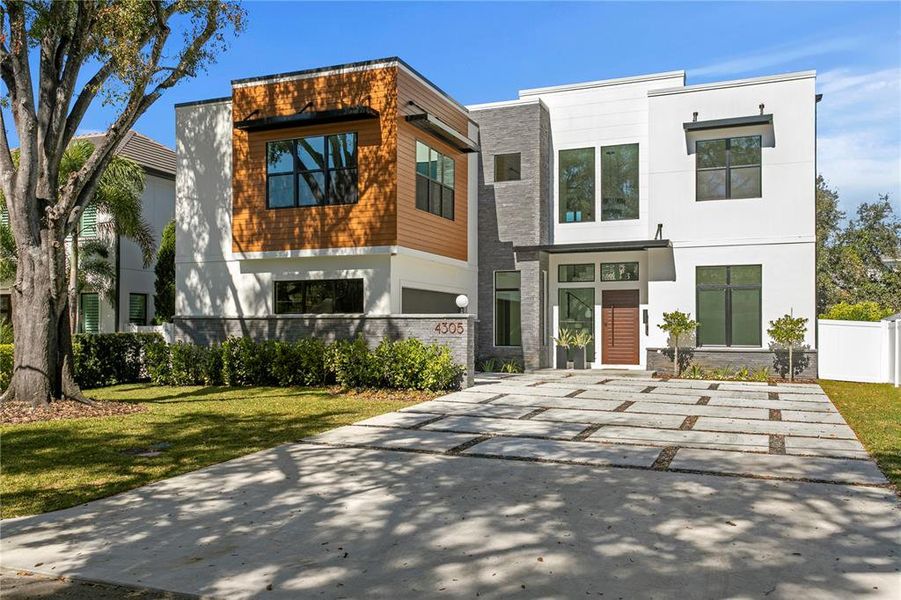 Front exterior of a new home in , Tampa, FL, highlighting curb appeal (Image 30).