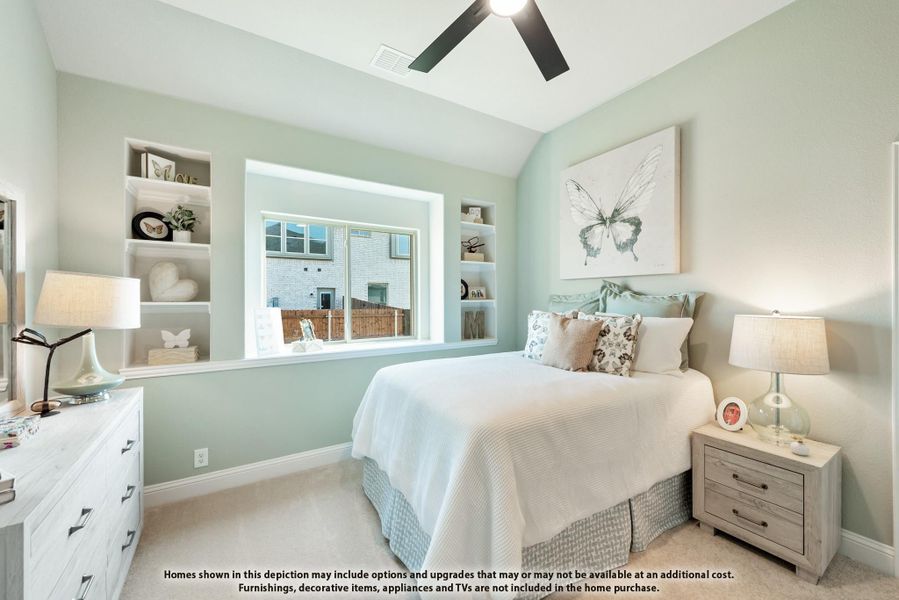 Bedroom with light green walls, built-in shelves, ceiling fan, and large window Bedroom with light green walls, built-in shelves, ceiling fan, and large window