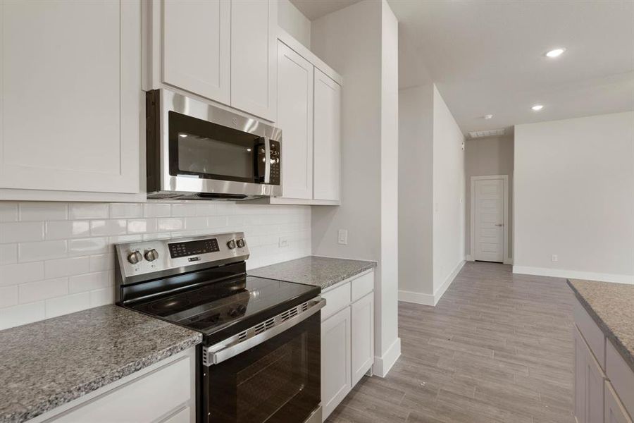 Furnished interior view inside a new home in Saddleback Estates, Boyd (Image 14). Furnished interior view inside a new home in Saddleback Estates, Boyd (Image 14).