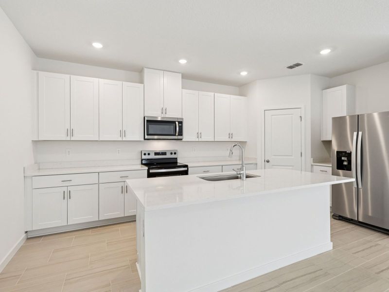 Furnished interior view inside a new home in Flagler Village - Classic Series, Palm Coast (Image 5).