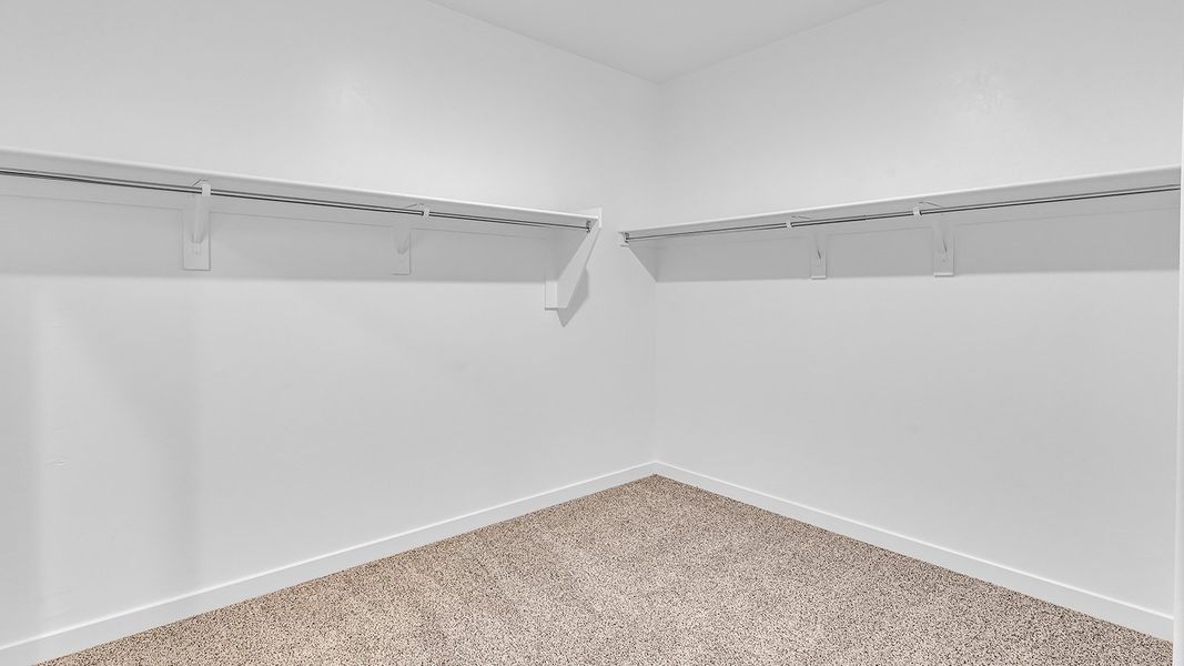 Representative unfurnished interior of a home built from the Harris by D.R. Horton in The Oasis at Rocking K, Vail (Image 37).