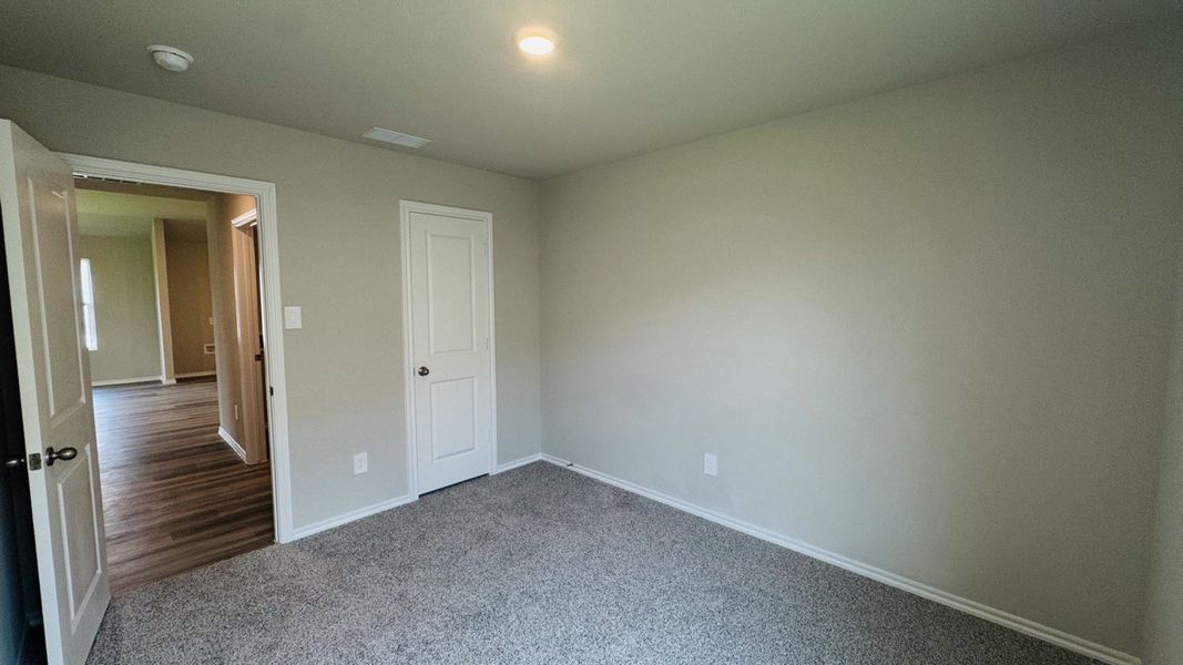 Spacious, unfurnished interior of a new home in Lonestar at Liberty Trails, Fort Worth (Image 16).