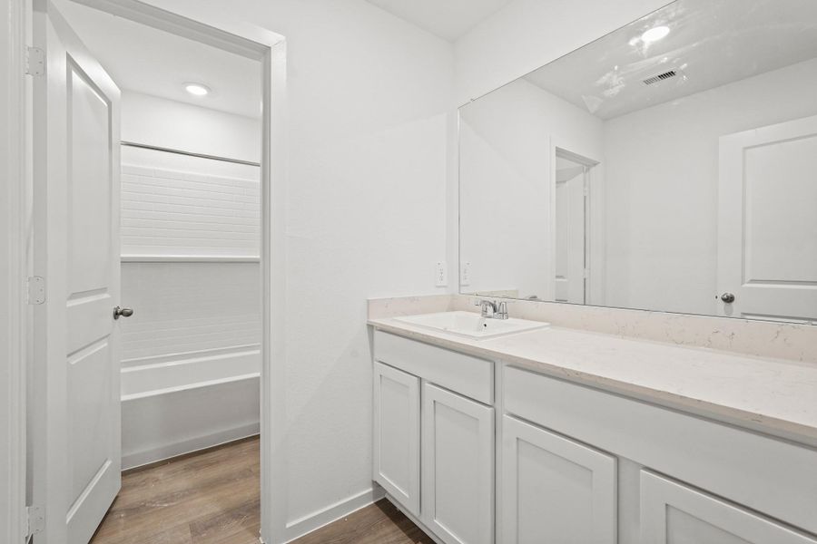 Furnished interior view inside a new home in New Waverly Station, New Waverly (Image 4). Furnished interior view inside a new home in New Waverly Station, New Waverly (Image 4).